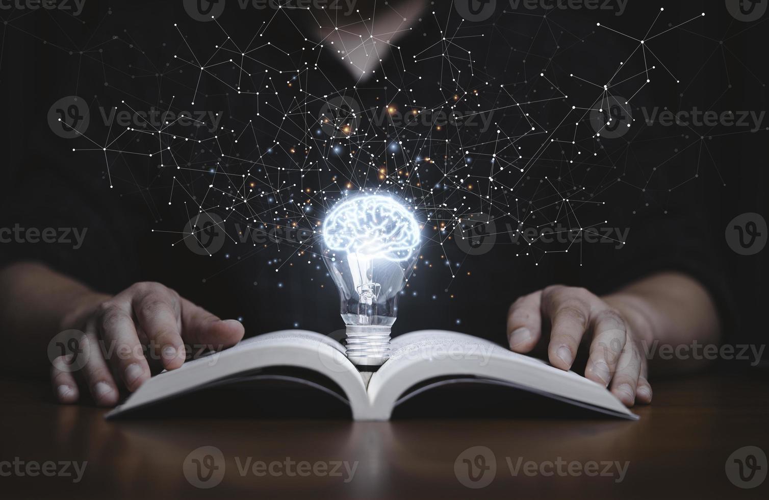 glowing-lightbulb-with-virtual-brain-on-open-book-and-connection-line-for-reading-and-education-make-smart-or-creative-thinking-idea-concept-photo